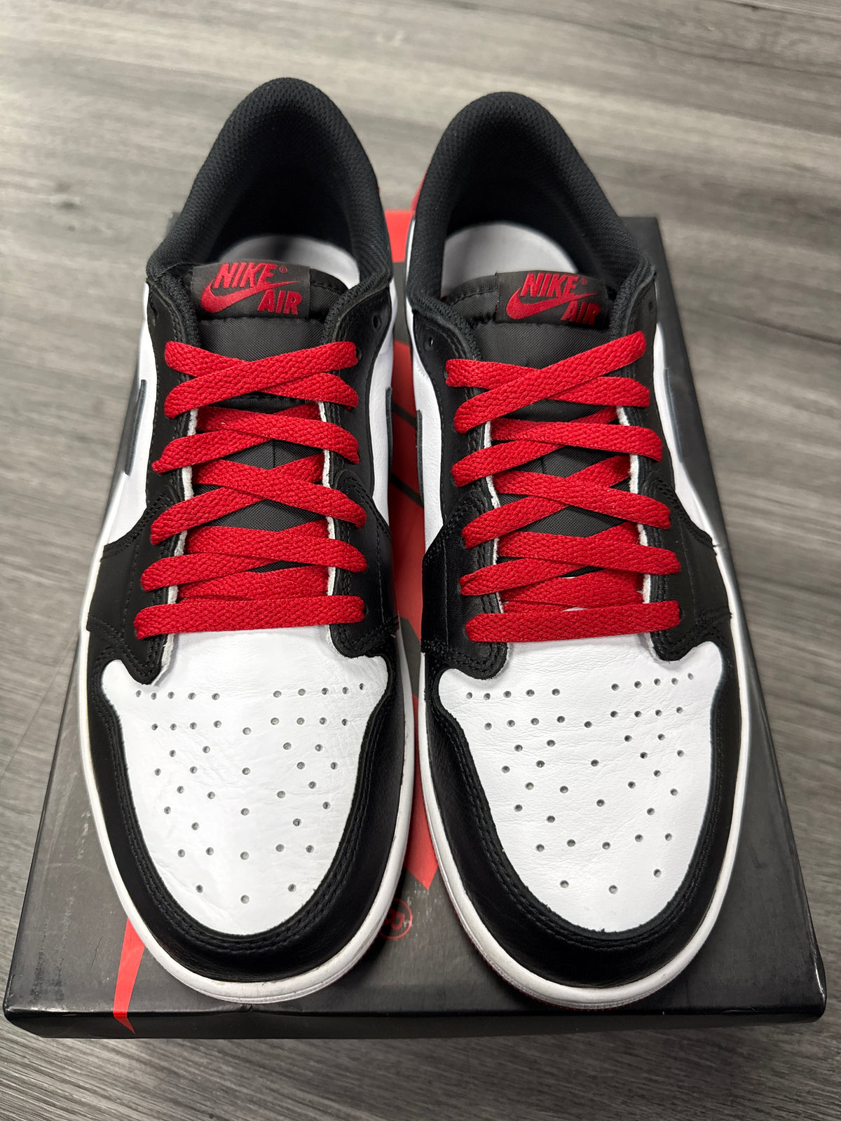 Jordan 1 Low Black Toe - size 10.5